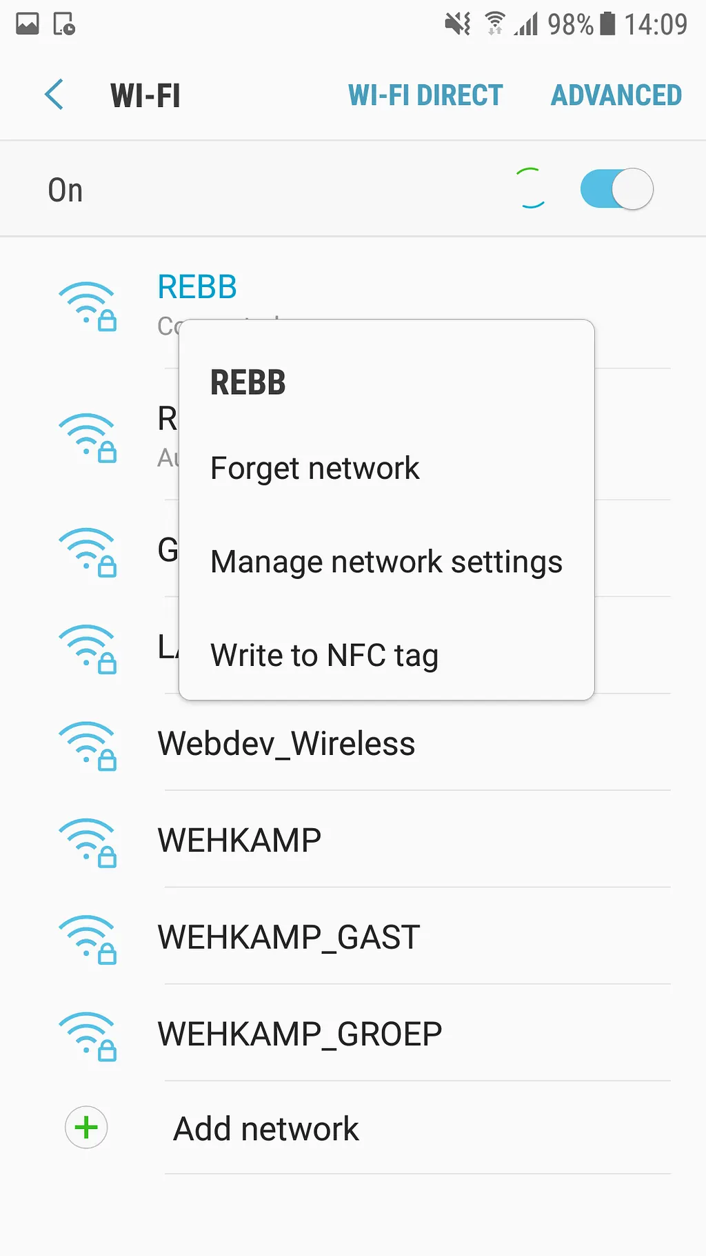 Android Wi-Fi list with a long-press menu offering Forget network, Manage network settings and Write to NFC tag
